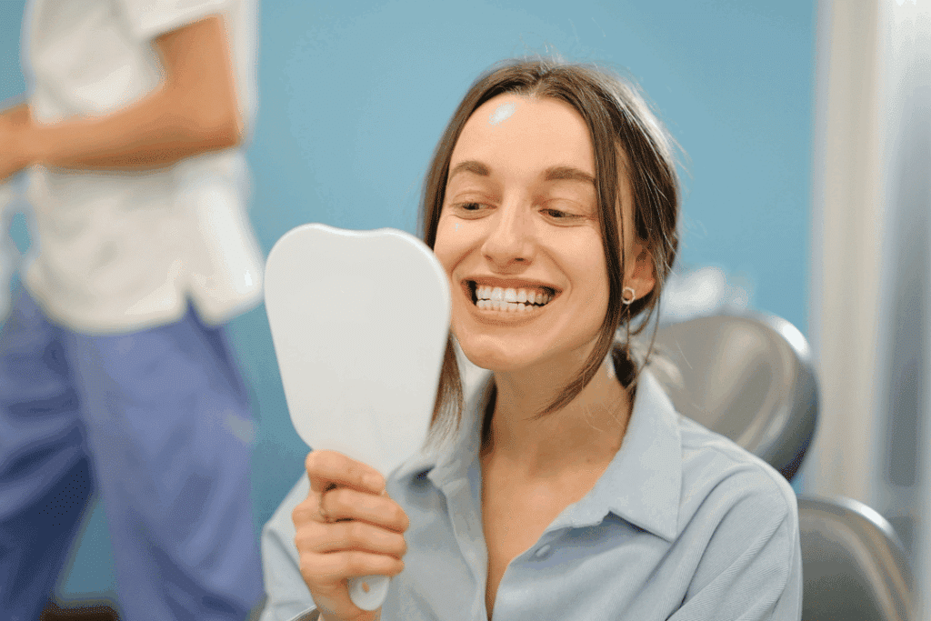 smiling patient after dental implant procedure